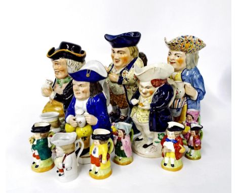 Collection of thirteen various ceramic Toby jugs, to include four Staffordshire jugs, four large Staffordshire jugs and a fur