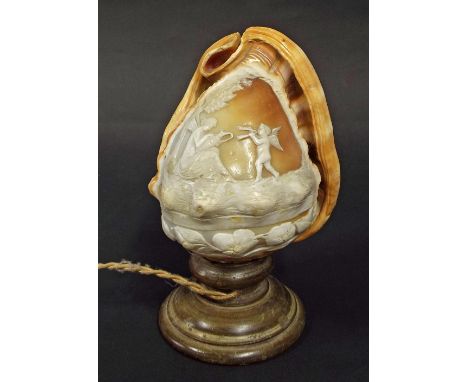 Interesting carved cameo conch shell light decorated with a Classical scene with a playful putti and seated maiden holding a 