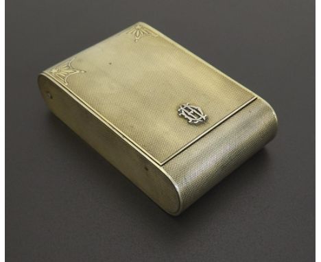Asprey, London silver-gilt folding travel clock case, with a square gilded bezel in an engine turned rounded case applied wit