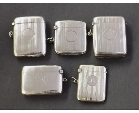 Five silver vesta cases, each with engine turned pin stripe decoration, 6oz approx (5)
