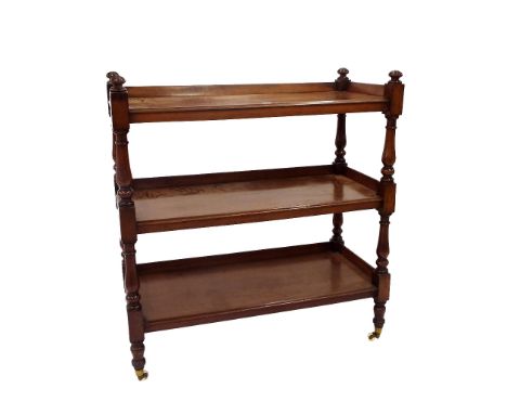 Good quality Victorian mahogany three tier buffet, with baluster supports upon original ceramic castors, 42" wide, 45" high