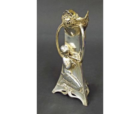 WMF polished pewter three handled spill vase cast with a girl playing two flutes, 7.5" high (at fault)