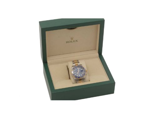 Rolex Oyster Perpetual Date Submariner: a steel and gold cased automatic wristwatch, ref 116613LB, serial no.70559xxx, the bl