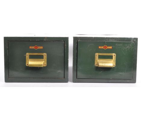 A pair of vintage 1960's Criterion table top, industrial stacking metal / steel filing cabinets. In an army green colourway w