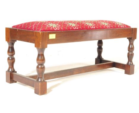 A 19th century Victorian style rectangular mahogany foot stool / footstool dating from 1963.&nbsp;Raised on turned supports w