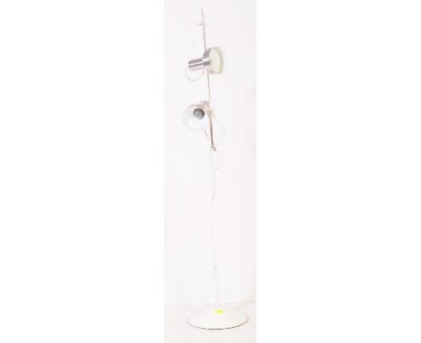 A contemporary floor standing / standard lamp comprising of two identical aluminium shades sitting one above another with str