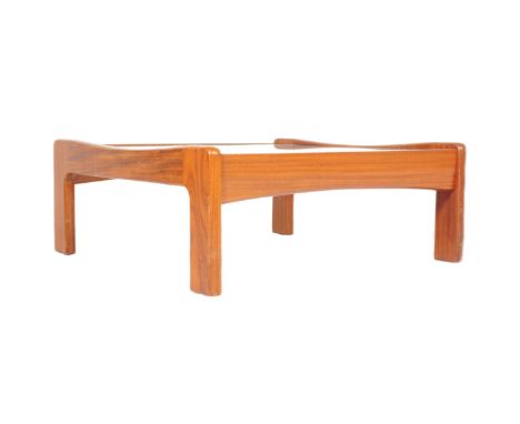 A retro vintage mid 20th century teak and glass coffee occasional table being of square form with squared supports and glass 