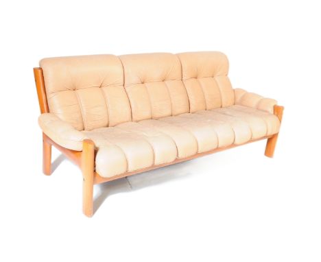 A retro vintage mid 20th century Danish teak wood and leather three seater 'Montana' sofa settee by Ekornes. Having a cushion