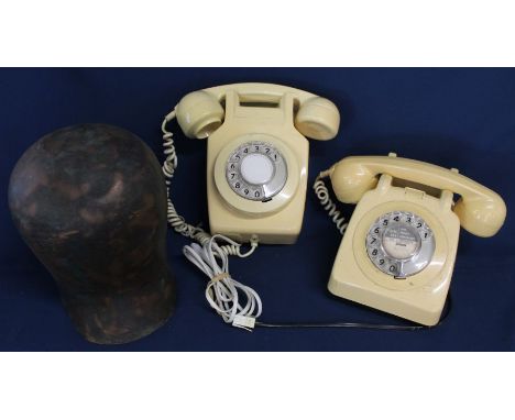 Wall mounted cream rotary dial telephone &amp;&nbsp; one other and a copper hat block&nbsp;