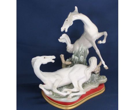 Large Lladro "Playful Horses" on stand, height 41cm without stand (2 firing cracks to base)