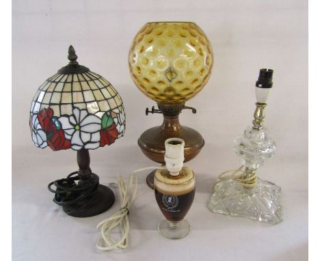 Table lamps to include Whitbred bar lamp, a converted oil lamp (no electrics) a Tiffany style lamp and a glass lamp (all plug