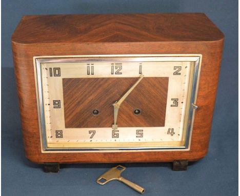 Art Deco gong striking mantel clock in a walnut case Ht 22cm L 30cm