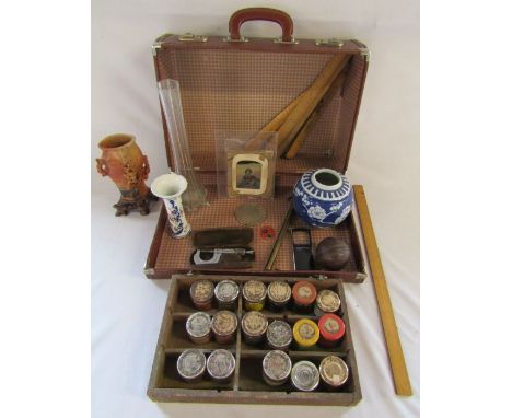 Small suitcase with contents to include wooden school rulers, vintage powder paints, Japanese vase, salter scale, sandstone v