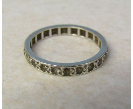 Tested as 9ct gold full eternity ring with spinel stones size N weight 2.1 g