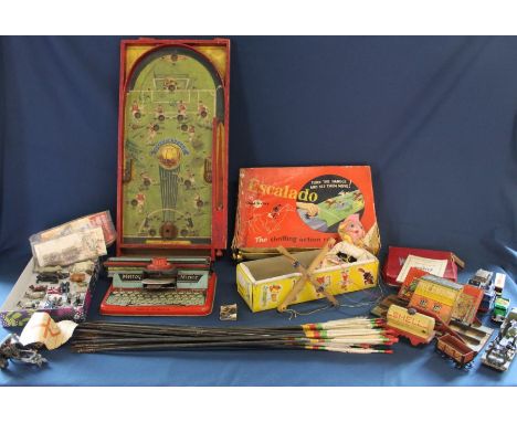 Selection of vintage toys including Chad Valley Escalado, Chad Valley Soccatelle, Pelham puppet, The Game of Wembley, Mettoy 