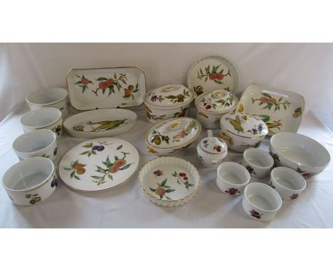 Royal Worcester 'Evesham' table ware to include serving dishes, flan dishes, cake plate, soufflé pots etc may include a small