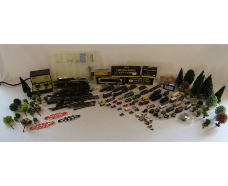 Collection of N gauge railway track and accessories to include carriages, trees, people, cars, trains 47160 &amp; 3848 also b
