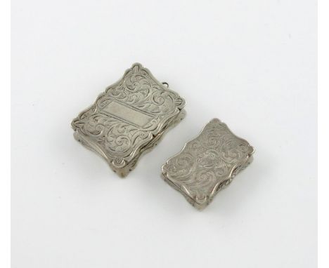 A Victorian silver vinaigrette, by Hilliard and Thomason, Birmingham 1881, rectangular form, engraved foliate scroll decorati