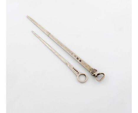 A George III silver meat skewer, probably by Thomas Whipham and Charles Wright, London 1765, tapering form, with a shell and 