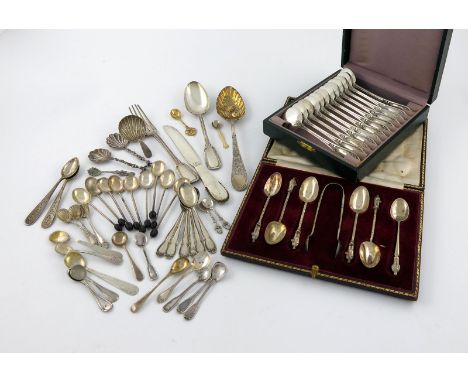 A mixed lot of silver flatware, comprising: a Danish Beaded pattern knife, by Georg Jensen, a cased set of twelve continental