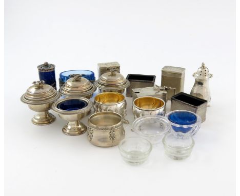 A mixed lot of silver condiments, various dates and makers, comprising: a five-piece Art Deco condiment set, Birmingham 1936,