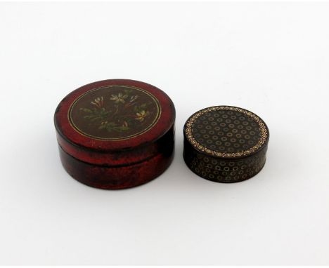 λ A 19th century tortoiseshell snuff box, circular form, with an inlaid gold border and painted decoration, diameter 4.8cm, p