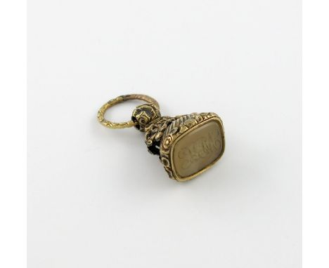 A Victorian gold cased fob seal, rectangular form, embossed foliate and scroll decoration, hardstone matrix, ring handle, len