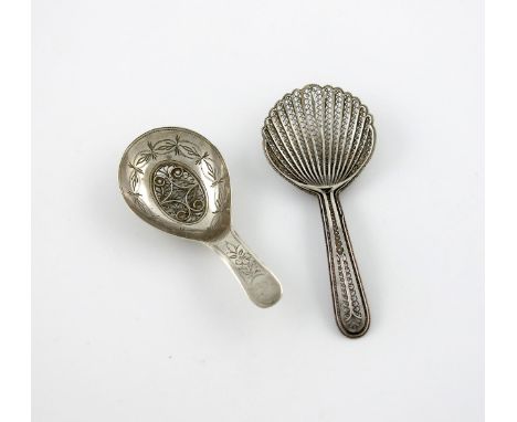 A George III silver caddy spoon, by Samuel Pemberton, Birmingham 1802, the oval bowl with engraved decoration and set with an
