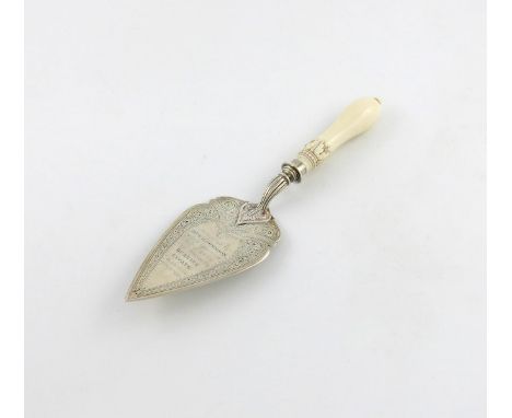 λ A Victorian presentation silver trowel, by Walker and Hall, Sheffield 1881, triangular blade with a presentation inscriptio