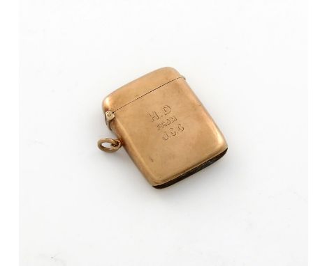 A 9 carat gold vesta case, by Joseph Walton and Co, London 1913, plain rectangular form, with a ring attachment, initialled, 