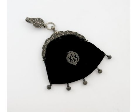 A 19th century Dutch silver-mounted bag, 1811-1812, the mounts with figures, urns and scroll decoration, the velvet bag with 