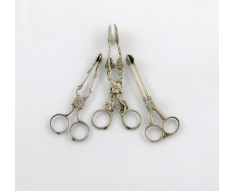 A pair of William IV silver naturalistic sugar nips, by Rawlings and Summers, London 1834, ring handles, the stems with leave