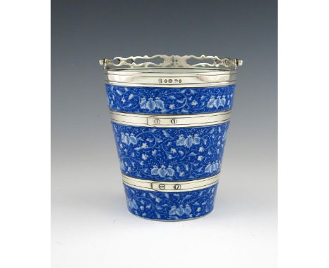 A silver-mounted ceramic ice bucket, by T. Harwood and Son, Birmingham 1879, tapering circular form, the Japanese blue cerami