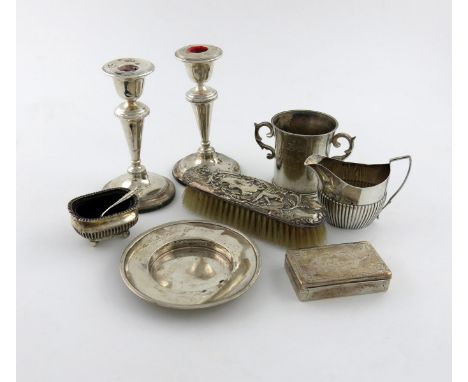 A mixed lot of silver items, various dates and makers, comprising: a two-handled cup, by Carrington and Co, London 1934, insc