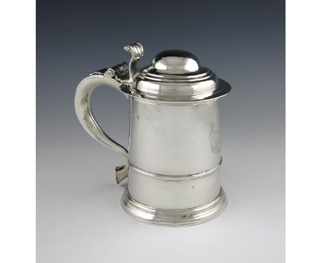 A George I silver tankard, by William Darker, London 1720, tapering circular form, lower girdle, scroll handle with scratch i