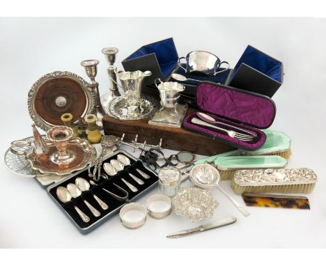 λ A mixed lot, comprising silver items: a cased christening bowl and spoon, Sheffield 1919 and 1920, a silver-mounted glass t