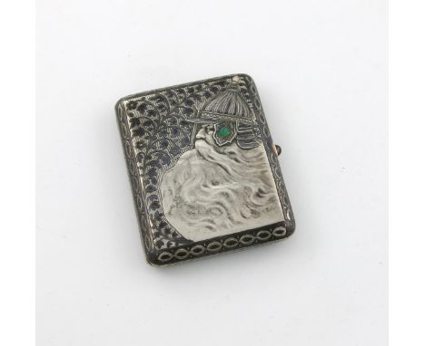 A Russian silver and niello work cigarette case, with a pseudo Fabergé mark, rectangular form, foliate decoration, embossed w
