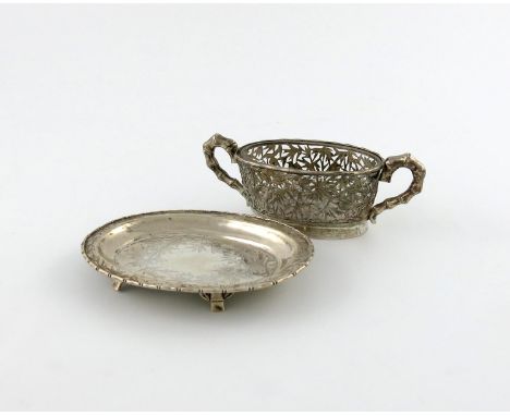 A Chinese silver two-handled bowl and stand, oval form, simulated bamboo scroll handles, pierced bamboo decoration, with a cl