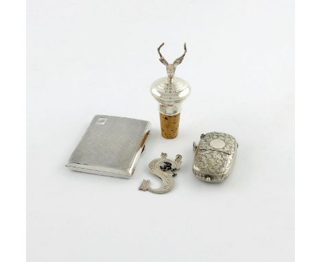 A small mixed lot, comprising silver items: an early 19th century Scottish silver 'cut-out letter' wine label, by George McHa