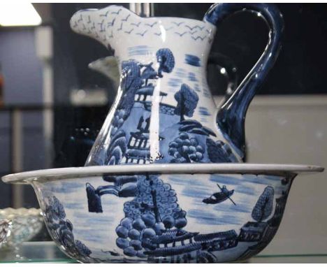 THREE CERAMIC ITEMS
including one washing set 'Ironstone China' with jug and washing bowl, along with a German bowl with latt