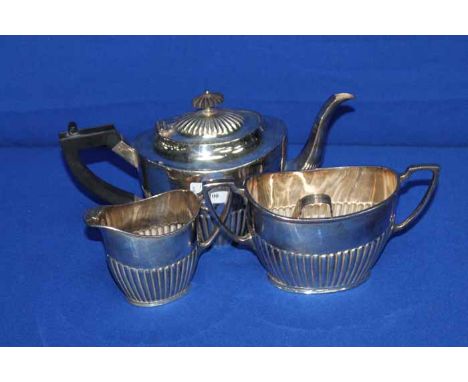 SILVER PLATED THREE PIECE TEA SERVICE AND A SILVER TABLE CANDELABRUM