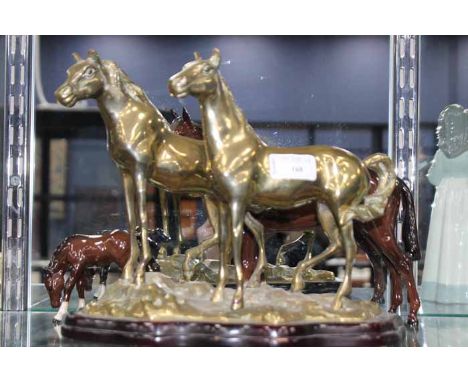BRASS FIGURE GROUP OF HORSES
together with two ceramic horses, the smallest horse is Doulton