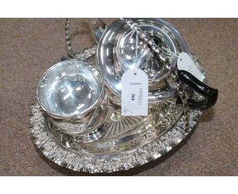 SILVER PLATED OVAL CAKE BASKET
together with a silver plated three piece tea service by Garrard & Co