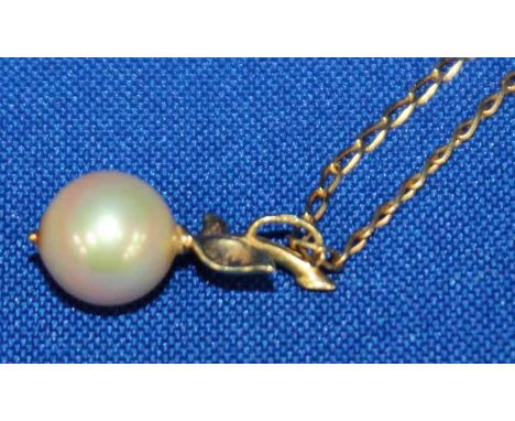 GOLD AND ENAMEL PEARL PENDANT AND CHAIN
modelled as a fruit with two gold leaves