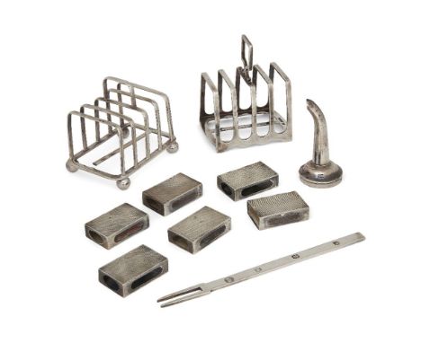 A group of silver comprising: two silver toast racks, one Sheffield, 1904, Harrison Brothers & Howson, the other Sheffield, 1
