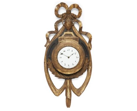 An Austrian gilt-wood and ebonised wall timepiece, circa 1900, the case surmounted with a ribbon-tied bow above a fluted twin