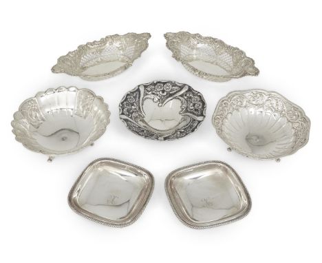 A group of silver comprising: a pair of Edwardian silver navette-shaped bonbon dishes, Birmingham, 1901, George Nathan &amp; 