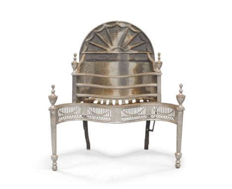 A George III style cast iron and steel fire grate, the arch back with beaded fan design, serpentine front with pierced apron 