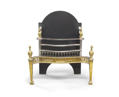 A George III style brass and cast iron fire grate, the serpentine front with pierced apron, urn shape finials, raised on squa