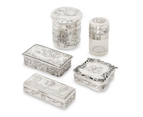 A group of putti-decorated silver trinket boxes and vanity vessels, comprising: an Edwardian silver mounted cylindrical glass